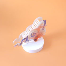 Clip Sugar octopus clip worn by model demonstrating comfortable hold