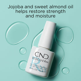 CND RescueRxx bottle in hand for scale showing compact 0.5 fl oz size convenience