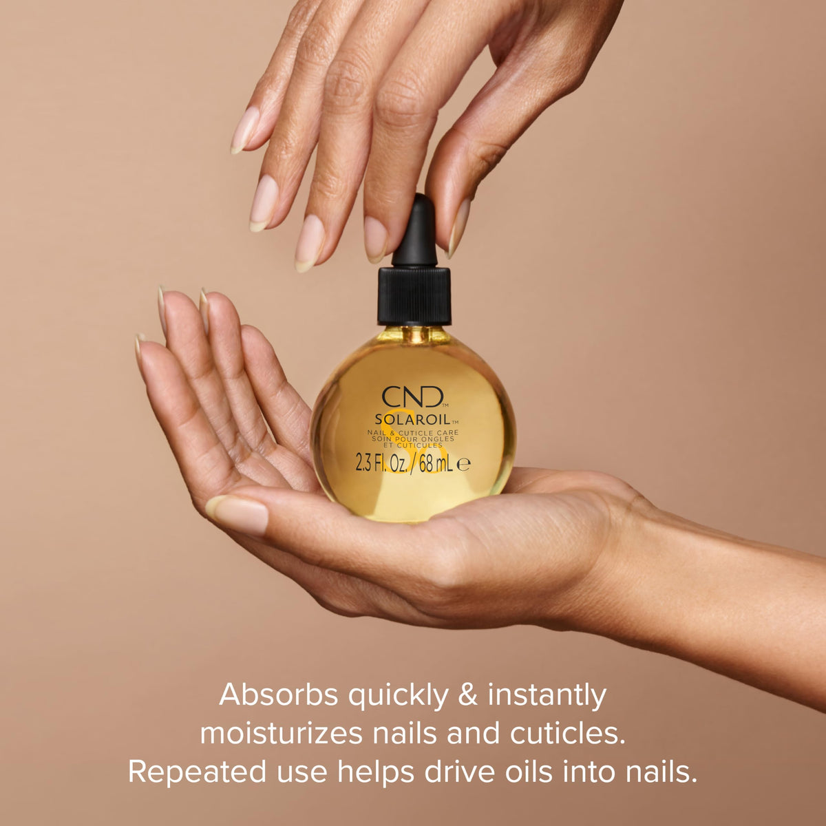 Macro oil droplet of CND SolarOil showing lightweight texture and fast absorption