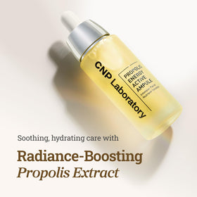 CNP Honey Glow Serum dropper dispensing a clear golden drop for precise application