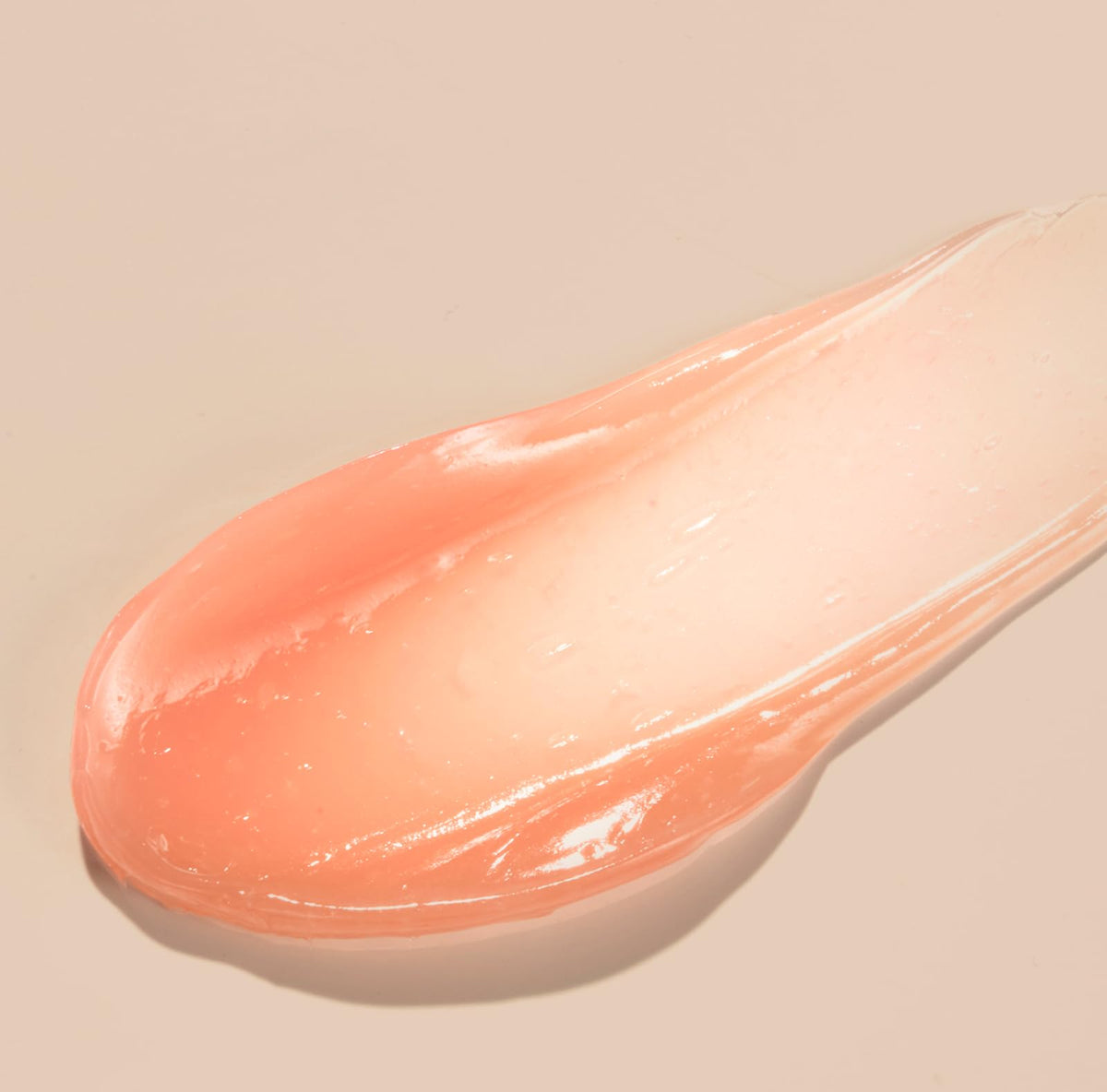 CNP honey lip butter texture close-up revealing creamy glossy finish for rich hydration