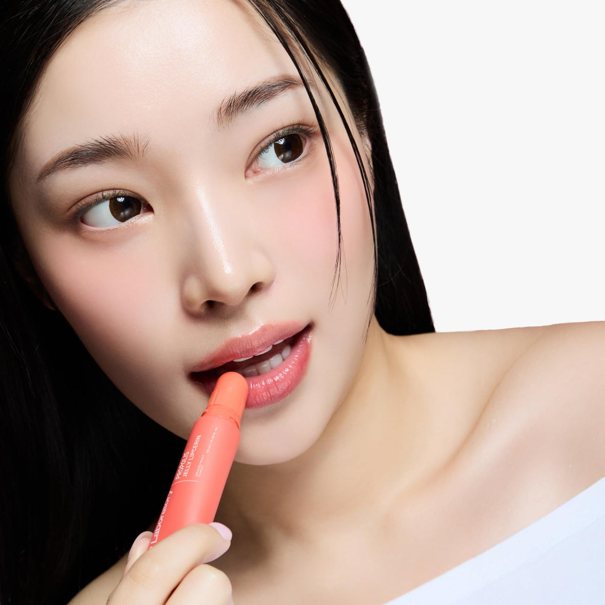 CNP texture swipe showing glossy, non-sticky shine and hydrating finish
