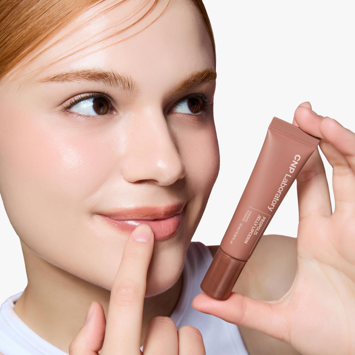 CNP texture swipe of Caramel Pudding showing glossy finish and buildable tint benefit