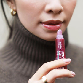 C.O. Bigelow open tube close-up showing glossy texture and moisturizing benefit