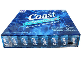 Person holding Coast bar under running water, demonstrating quick-rinse cleansing