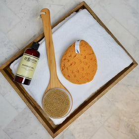 C. O. Bigelow in-shower use with loofah showing refreshing peppermint uplift