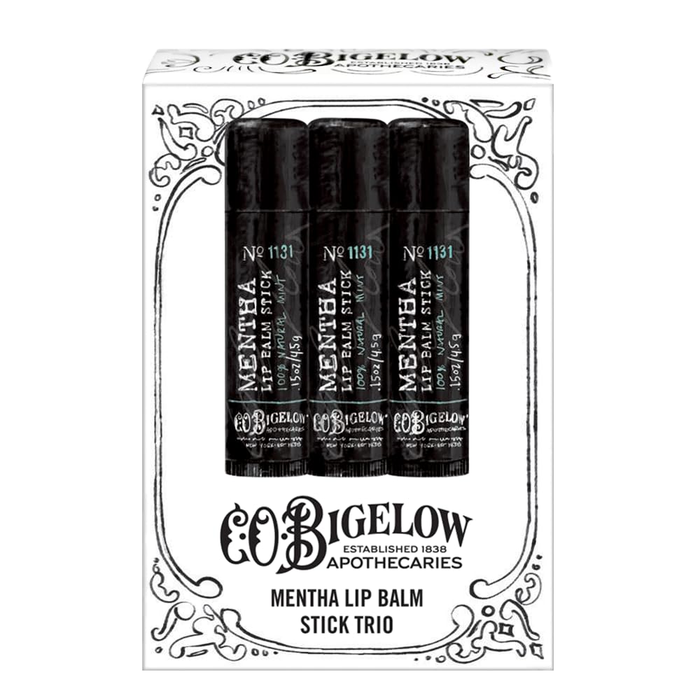 C. O. Bigelow lip balm held in hand illustrating compact size and travel convenience