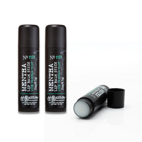 C. O. Bigelow close-up of balm tube tip displaying smooth texture and matte finish