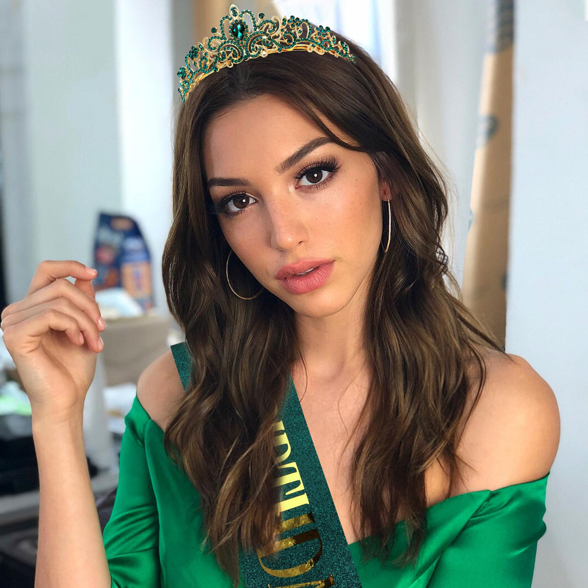 COCIDE model wearing sash and tiara at party illustrating flattering festive look
