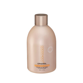 COCOCHOCO treated hair in use demonstrating reduced frizz and lasting shine
