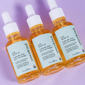 cocokind chia oil dropper releasing a drop highlighting purity and easy dosing