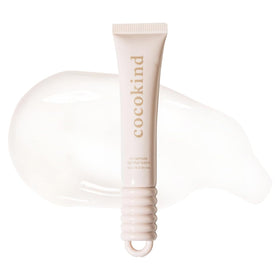 Cocokind clear lip blur front view showing compact tube and glossy finish