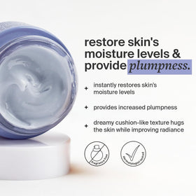 Cocokind cream texture on fingertip, demonstrating smooth, non-greasy hydration