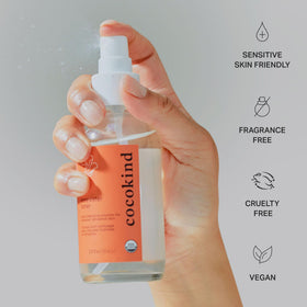 Cocokind mist applied to scalp showing soothing hydration and scalp comfort