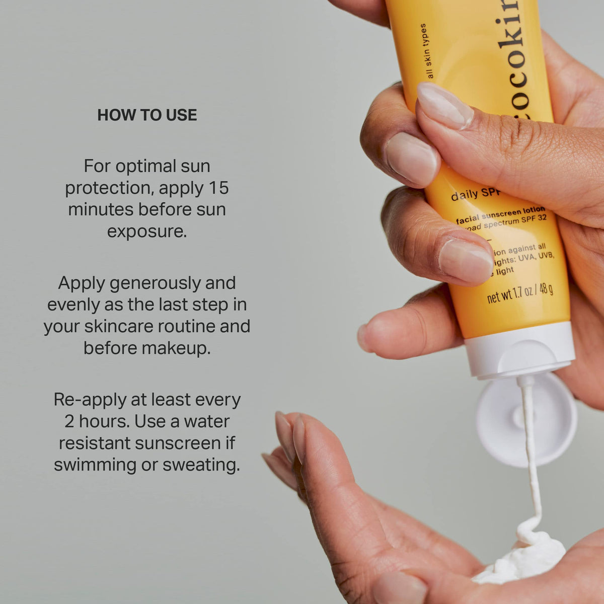 Cocokind applying sunscreen to hand demonstrating non-greasy feel