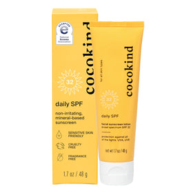 Cocokind bottle front packaging showing SPF 32 and benefits