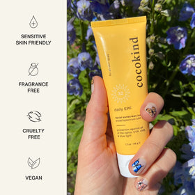 Cocokind sunscreen pump close-up highlighting easy application