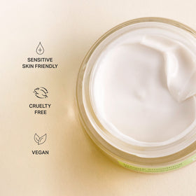 Jar in hand for scale showing Cocokind 1.7 fl oz travel-friendly size