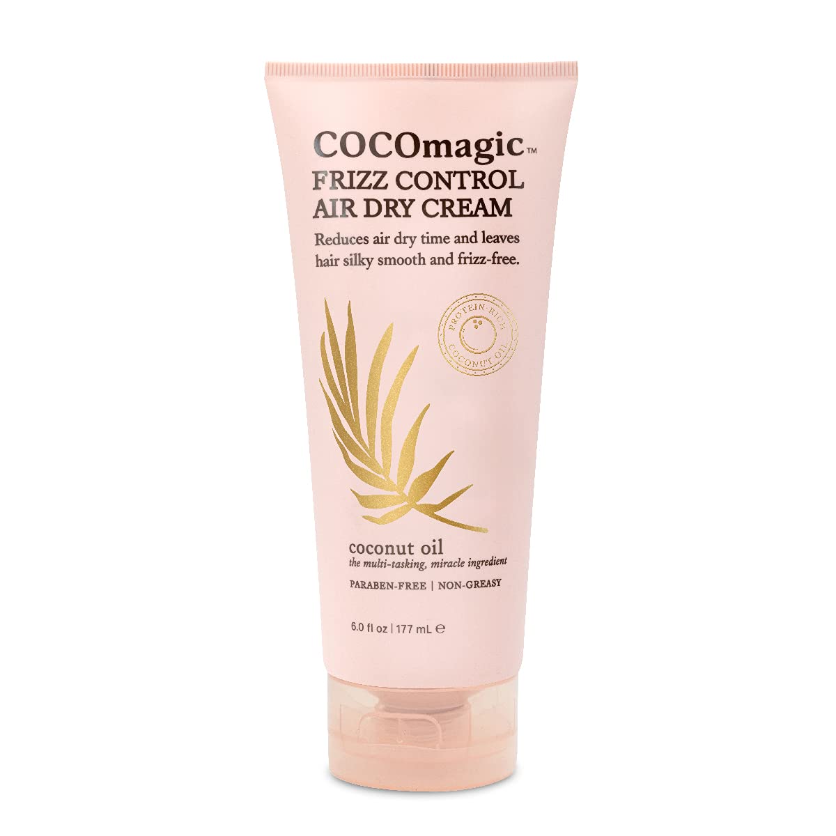 Cocomagic jar on bathroom shelf in styling routine conveying daily frizz-smoothing use