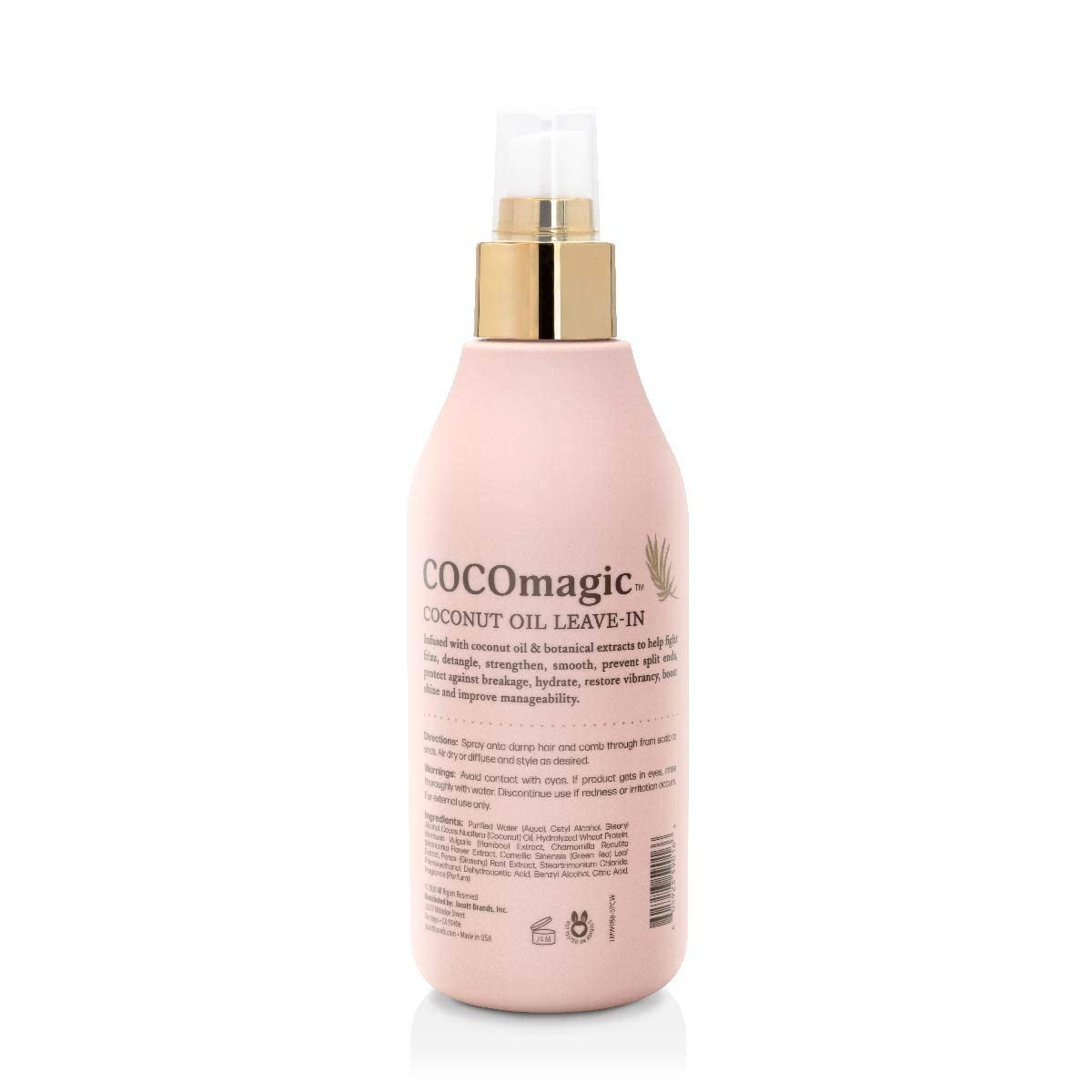 Cocomagic misting onto hair from spray bottle demonstrating easy application