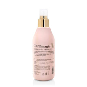 Cocomagic misting onto hair from spray bottle demonstrating easy application