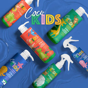 Cocomagic bottle in tropical shower setting evoking fresh scent