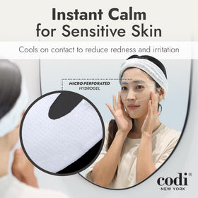 Codi New York mask next to hand for scale showing sheet size and coverage