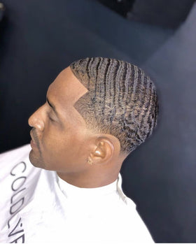 COLDLABEL Wolfin Pomade natural oils and shea butter display highlighting conditioning benefits
