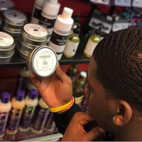 COLDLABEL Wolfin Pomade open jar revealing creamy balm texture for easy styling