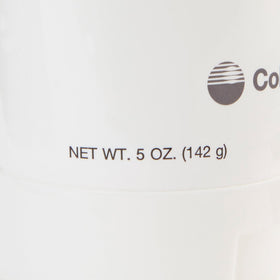 Coloplast Atrac-Tain cream texture on fingertip demonstrating smooth absorption benefit