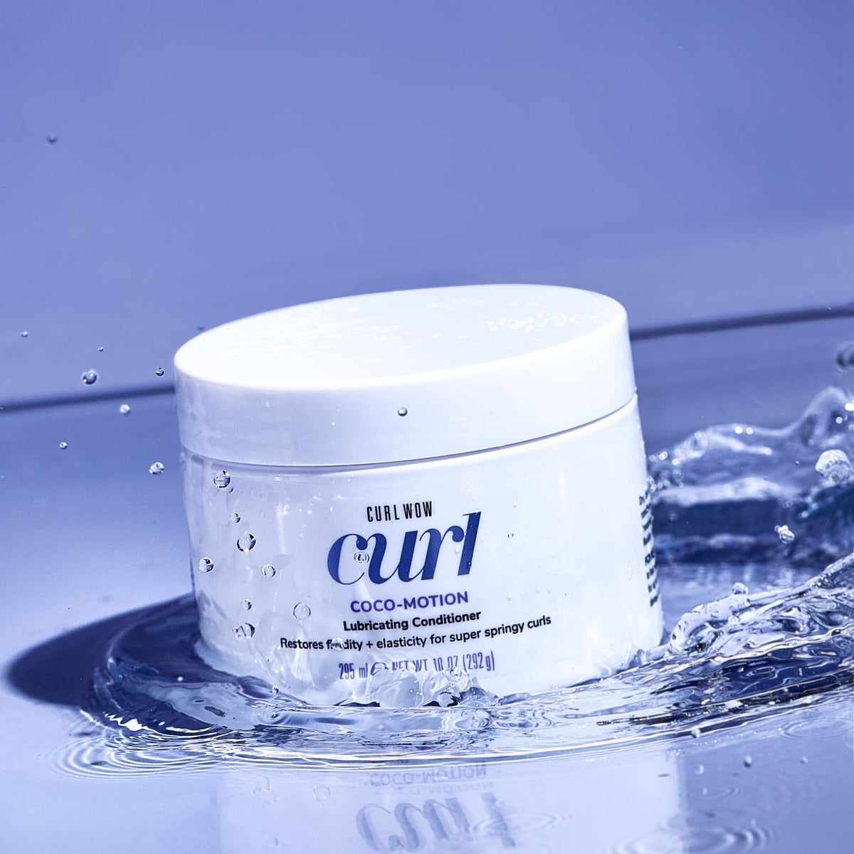 COLOR WOW pouring Coco-Motion texture to show lightweight slip benefit