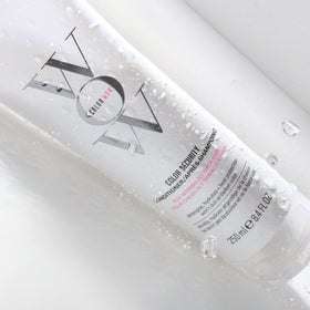 COLOR WOW applying conditioner to wet hair for easy detangling
