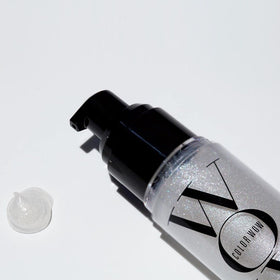 COLOR WOW label close-up highlighting UV protection and heat defense benefits