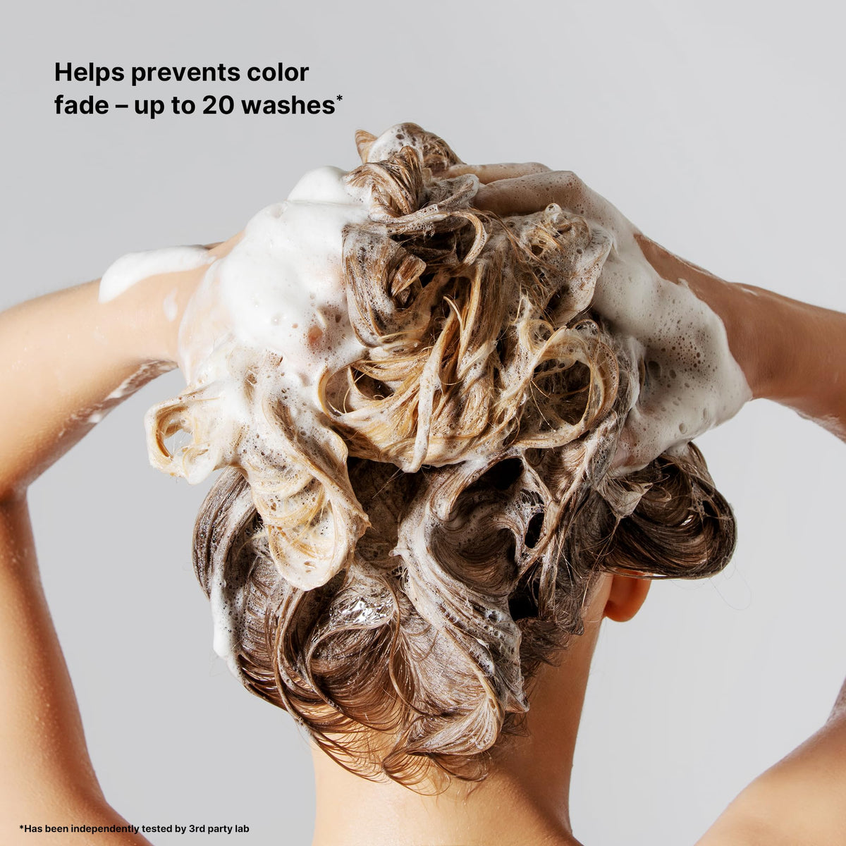 COLOR WOW rich creamy lather closeup demonstrating gentle cleansing benefit