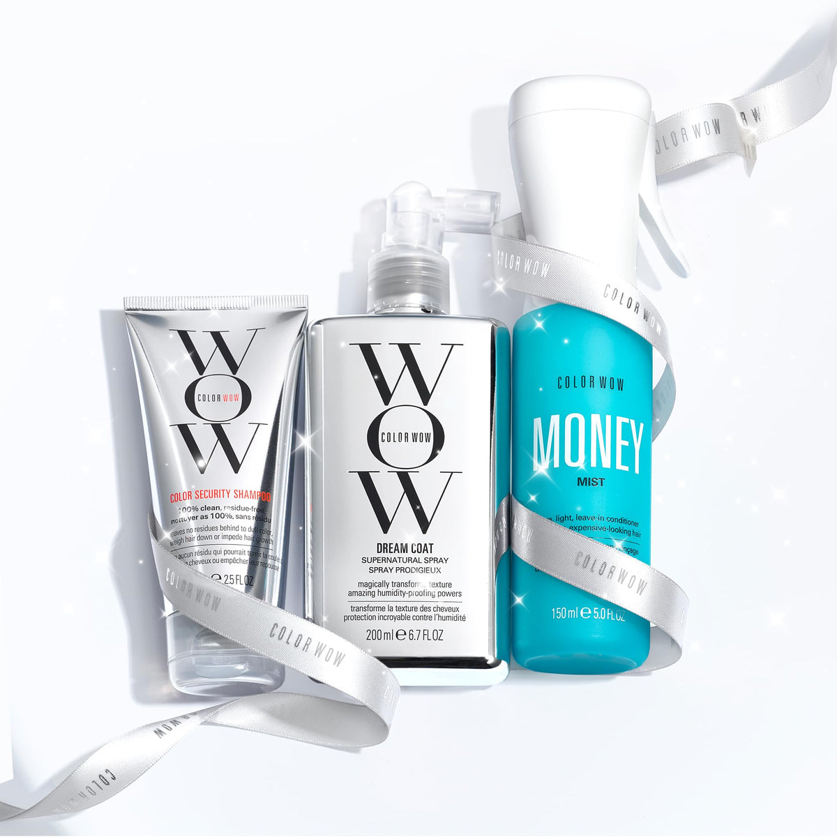 COLOR WOW Money Mist being sprayed on hair in salon-style setting for instant shine and slip