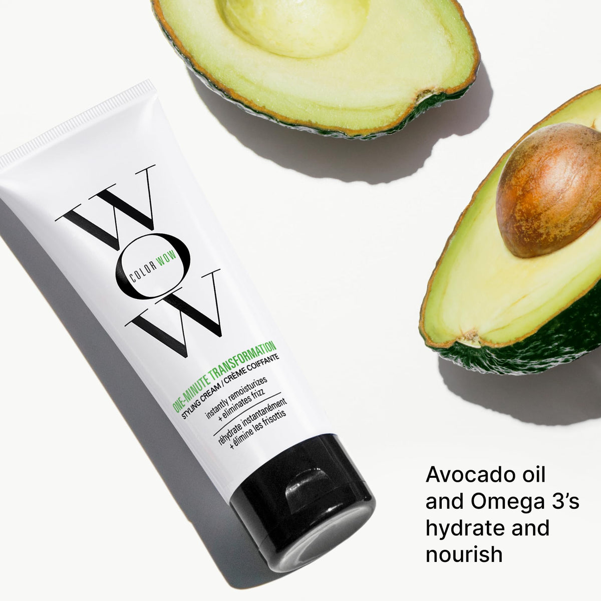 COLOR WOW tube beside a hand to show scale and convenient travel-friendly size