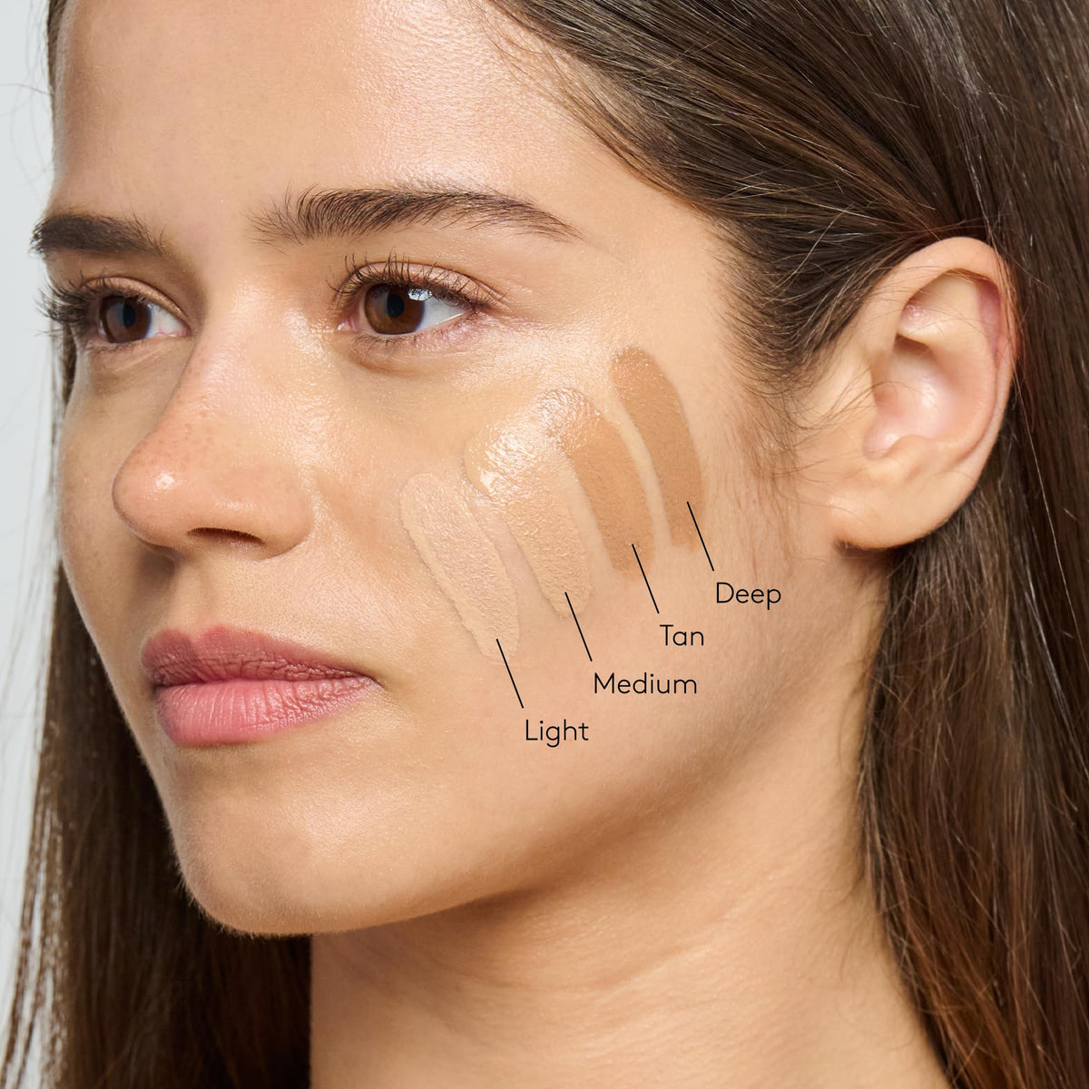 Colorescience product in hand to show compact travel-friendly size and volume