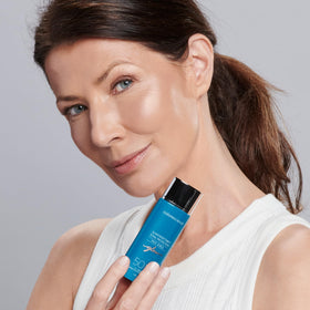 Colorescience on model showing dewy glow and natural-looking protection