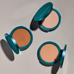 Colorescience application with brush demonstrating buildable medium-to-full coverage benefit
