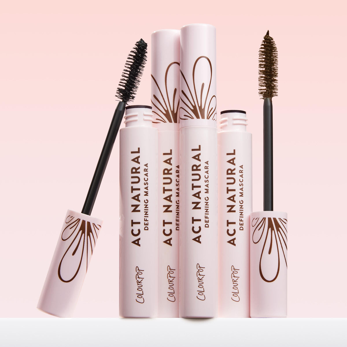 ColourPop mascara staged on vanity with shadow palette for everyday look