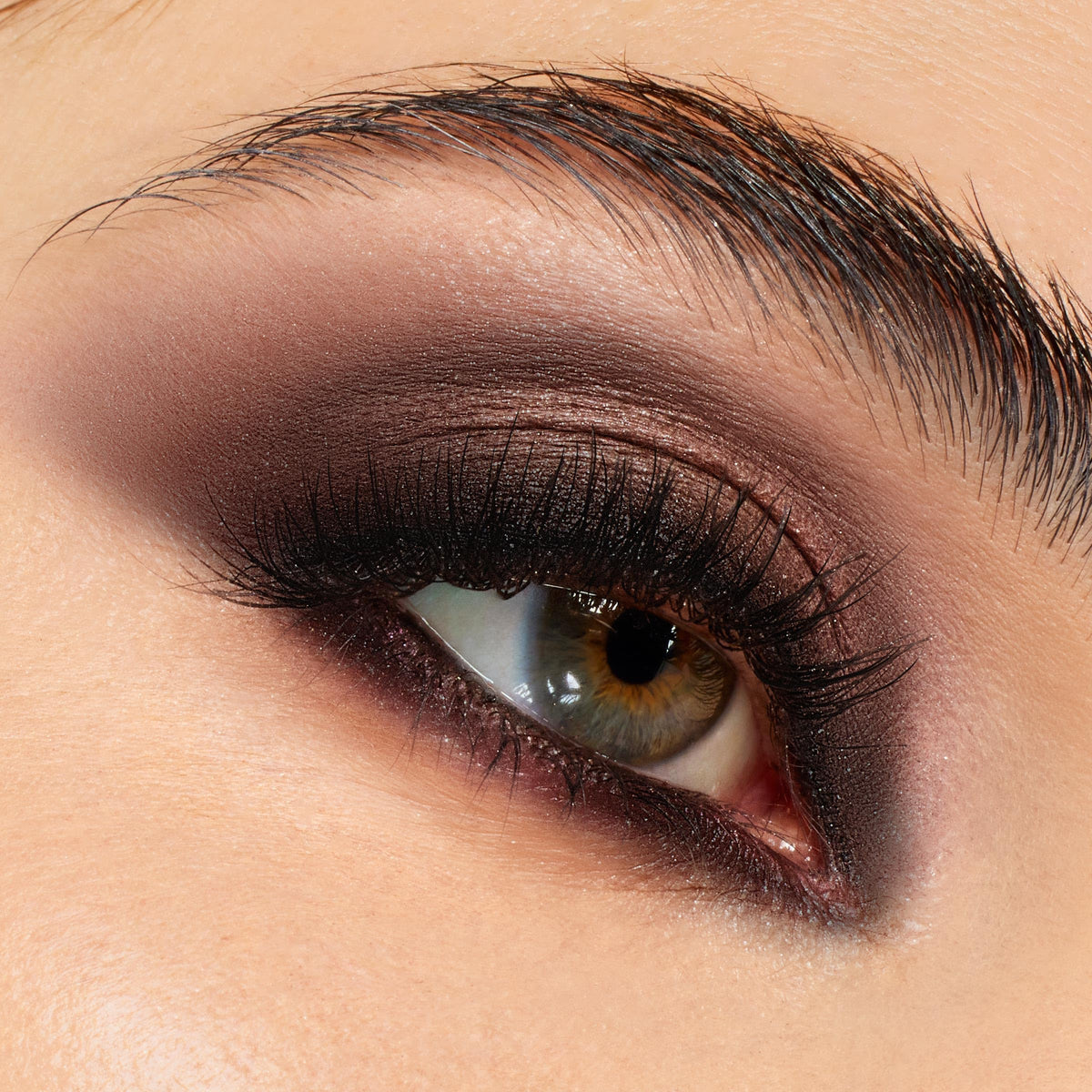 ColourPop metallic lid close-up showing pearlescent shimmer for luminous finishes