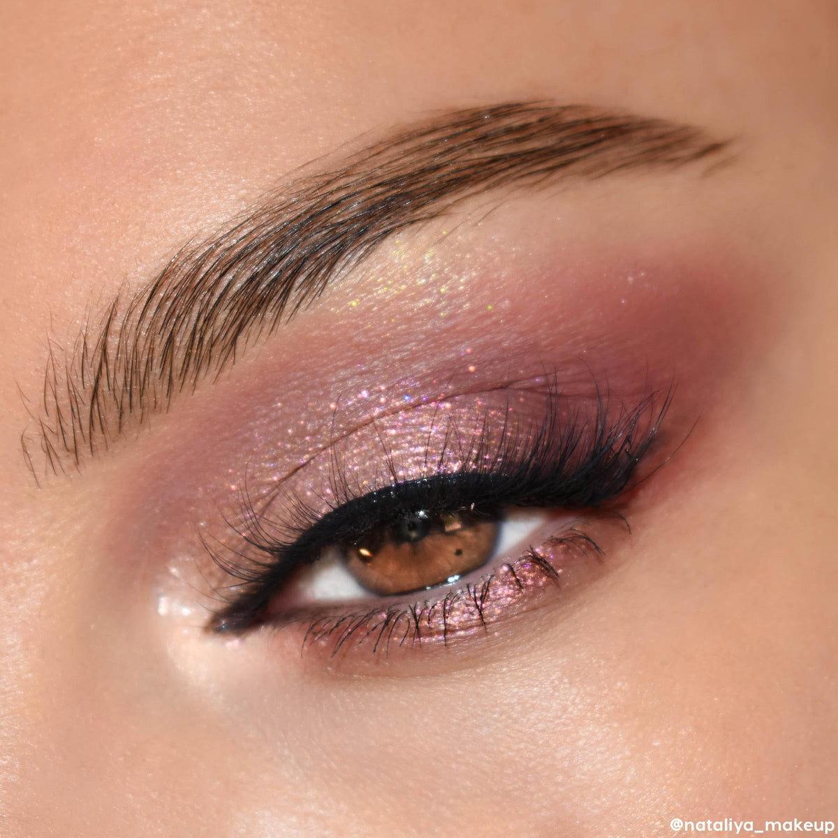 ColourPop swatches on arm demonstrating buildable color payoff and blendability