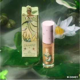 ColourPop Ambitious Tiana next to everyday items showing compact travel-friendly size