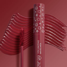 ColourPop BFF Mascara swatch on skin showing wine burgundy pigment payoff