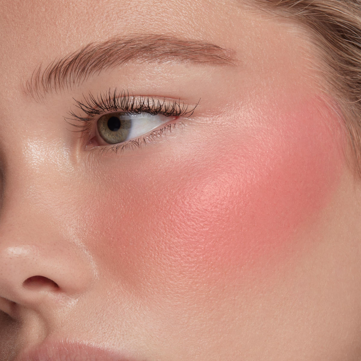 ColourPop liquid blush applied on cheeks illustrating natural glow and hydrated look