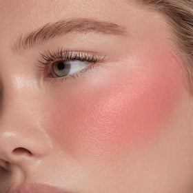 ColourPop liquid blush applied on cheeks illustrating natural glow and hydrated look