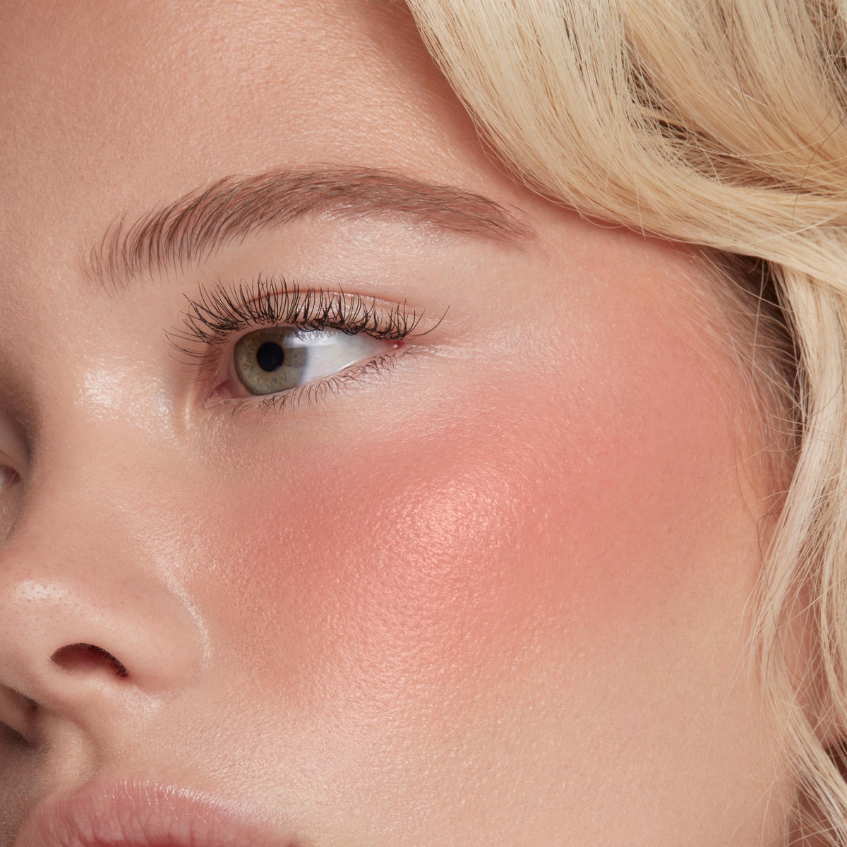 ColourPop blush texture droplet on hand showing dewy consistency and hydrating finish for natural glow