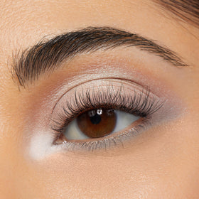 ColourPop Cloud 9 palette with brush applying metallic shade for strong lid payoff