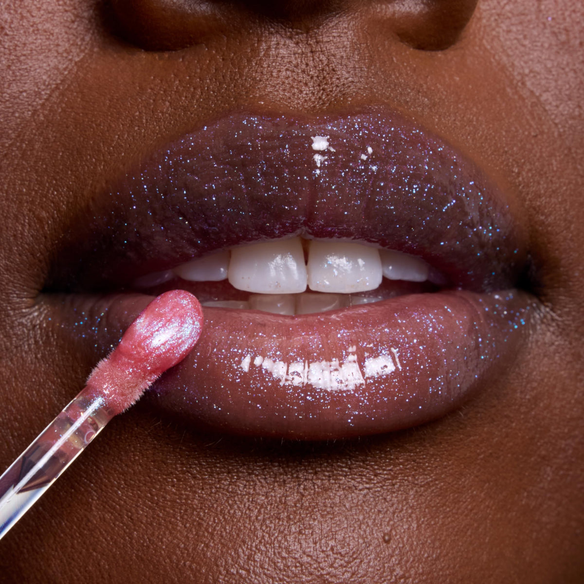 ColourPop Courageous Rapunzel gloss texture droplet highlighting smooth, non-sticky formula
