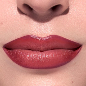 ColourPop lip kit held in hand to show compact size and travel-friendly convenience